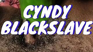 cyndy blackslave fucks a cucumber till she squirts in homemade clip