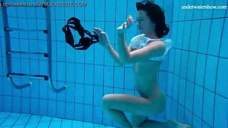 Horny czech teen strips naked fast, showing small tits and tight pussy outdoors underwater