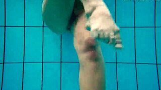 Horny czech teen strips naked fast, showing small tits and tight pussy outdoors underwater