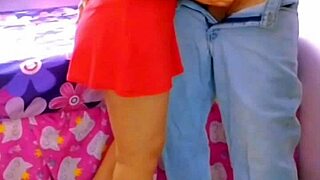 Hey, just enjoying a fun moment with my wife in a red dress.