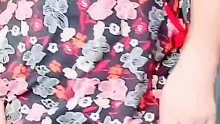 Pink shirt sissy crossdresser shows off big butt in homemade clip.