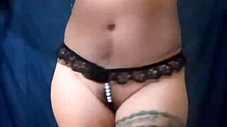 sexy mexican latina dances in lingerie showing ass and tits?