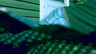 time lapse of skinny woman stretching against steps at night