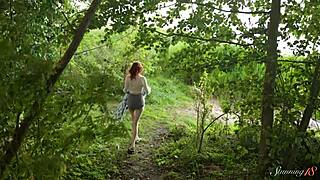 Pretty teen redhead Mia masturbates to wild orgasm beside the lake!