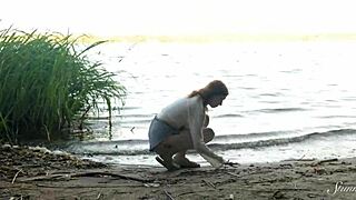 Pretty teen redhead Mia masturbates to wild orgasm beside the lake!