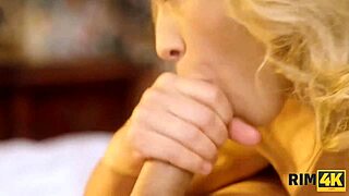 A stranger performs a rimjob on a european woman with big fake tits during a game.