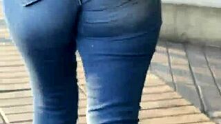 this latina shows off her curves in tight jeans