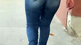 this latina shows off her curves in tight jeans