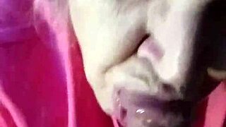 The hot milf is just casually sucking on a big monster cock like it's no big deal.