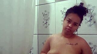 I am taking a nice bath and fingering my pussy in the shower