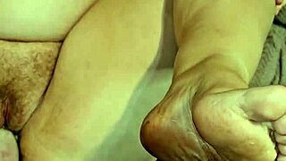wet pussy gets foot fucked!