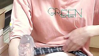 Shemale Ting Xuan Sucks Dildo in Sexy Skirt