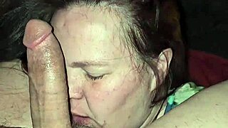 This milf just slurps that cock with deep throat skills while playing with her tits.