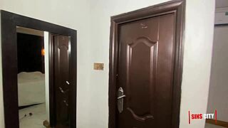 mature lady interacts with hotel attendant in public