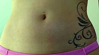 Blonde housewife with small waist rubs suncream on her tits while sunbathing in public