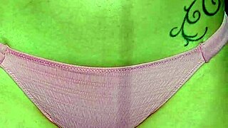 Blonde housewife with small waist rubs suncream on her tits while sunbathing in public