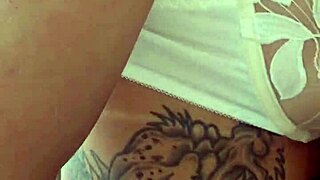 Tattooed latina gives intense blowjob to well-endowed black man in public, he cums inside.