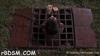 Bound couple engages in rough spanking and bondage sex with intense domination