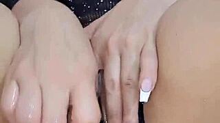 Sexy girl fingers herself and fucks her pussy with a big eggplant