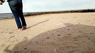 A couple enjoy beach walk with a hot slut