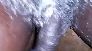 Nineteen-year-old boy shaves and masturbates his big black dick