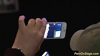 Cock sharing gets wild on stage at public sex fair. European babes rock the scandal!