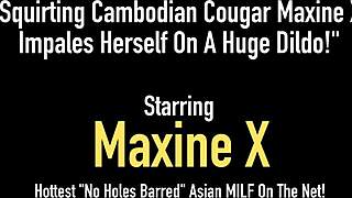 Hey, can you believe Maxine X squirts while impaling on a huge dildo?