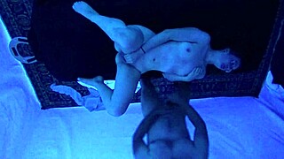 gigi breeze gets a blacklight massage with gagging and deepthroat