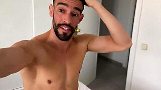 In the morning, a hot guy awakens and strokes his massive cock