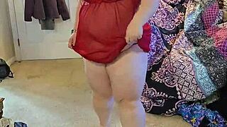 Bbw amateur performs solo striptease while undressing in lingerie