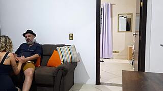 While the cuckold showered, his wife bent over on the sofa with his brother.