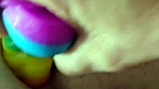 I love how this fat brunette toys her ass with rainbow dildo for gaping creampie
