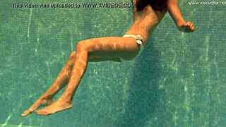 Irina Russaka bathing in the pool.
