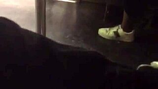 A big ass teen gropes tits on the train while being watched