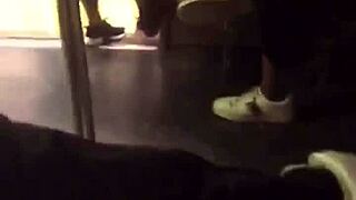 A big ass teen gropes tits on the train while being watched