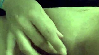 Julia Soto teases in sexy black lingerie while pleasuring herself in a private moment.