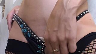 wearing fishnet stockings, sophia lynn fingers herself and gets ready for intense penetration!