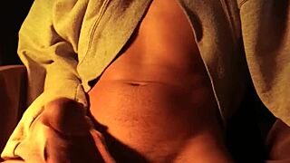 Guy in sweater masturbates loudly in bedroom