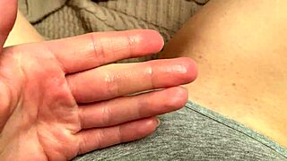 Petite virgin rubs her wet pussy lips through panties, fingering to orgasm with twitching legs