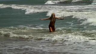 gorgeous teen agnes bathes naked in ocean with sensual undressing
