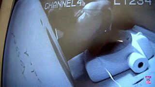 blonde nina rae plays with toy at glory hole