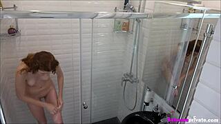 Young woman bathes while spied on with hidden camera