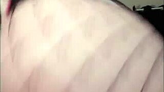 Watch this curvy redhead flash her pussy while dancing in fishnets.