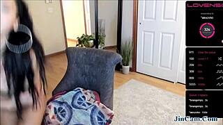 A horny girl masturbates with toys on webcam, looking very pretty