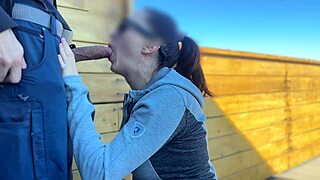 Wow, this redhead slut gave me a quick handjob on the roof!