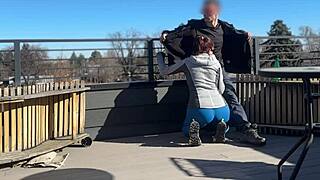 Wow, this redhead slut gave me a quick handjob on the roof!