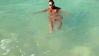 Sexy monika fox swims, masturbates, and squirts in the sea and on the beach