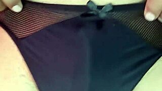 feeling sexy in satin thong while dancing