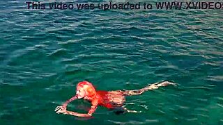 Naked Girl Flashing in Blue Water