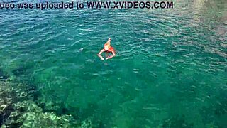 Naked Girl Flashing in Blue Water